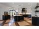 Updated kitchen with stainless appliances, a large island, and custom cabinets and counters at 1224 Union Club Dr, Winter Garden, FL 34787