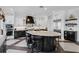 Gourmet kitchen features a large center island, custom cabinets, and high-end stainless appliances at 1224 Union Club Dr, Winter Garden, FL 34787