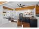 Bright kitchen and living area featuring modern appliances, wood ceilings and floors, and ample seating at 1224 Union Club Dr, Winter Garden, FL 34787