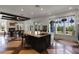 Spacious kitchen and dining area with coffered ceilings and an expansive island with bar seating at 1224 Union Club Dr, Winter Garden, FL 34787