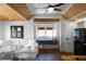 Cozy living area with a window bed, integrated storage, and kitchen access in modern farmhouse style at 1224 Union Club Dr, Winter Garden, FL 34787