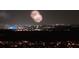 Panoramic cityscape view showcasing festive fireworks illuminating the skyline, creating a vibrant scene at 12706 S Lake Sawyer Ln, Windermere, FL 34786