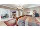 Cozy main bedroom featuring a fireplace, ensuite office, and neutral color palette creating a relaxing retreat at 12706 S Lake Sawyer Ln, Windermere, FL 34786