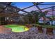Beautiful pool and lanai area boasts scenic sunset and lake views at 12706 S Lake Sawyer Ln, Windermere, FL 34786