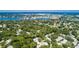 Wide aerial view of community showing lush landscape, lakes, and multiple residential buildings at 487 Oak Haven Dr # 487, Altamonte Springs, FL 32701