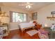 Bright bedroom with hardwood floors, natural light, and comfortable furnishings at 487 Oak Haven Dr # 487, Altamonte Springs, FL 32701