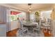 Charming dining room with natural light, stylish furnishings, and backyard views at 487 Oak Haven Dr # 487, Altamonte Springs, FL 32701