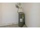 Hot water heater in the garage at 104 Birmingham Dr, Kissimmee, FL 34758