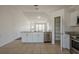 Bright, well-designed kitchen, features granite countertops, stainless steel appliances, and walk-in pantry at 104 Birmingham Dr, Kissimmee, FL 34758