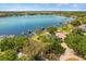 This aerial view shows the community lake and waterfront access at 10820 Wyandotte Dr, Clermont, FL 34711