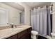 The bathroom features a granite vanity, a sink, a toilet, and a shower-tub combination at 10820 Wyandotte Dr, Clermont, FL 34711