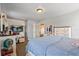 Bedroom with brick accent wall, plush carpet, and modern design at 10820 Wyandotte Dr, Clermont, FL 34711