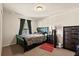 Cozy bedroom features a unique bedframe with LED lights and dark curtains at 10820 Wyandotte Dr, Clermont, FL 34711