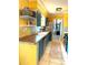 Efficient kitchen featuring stainless steel appliances, ample counter space, and bright, colorful accents at 1098 Henry Balch Dr, Orlando, FL 32810