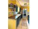 Charming kitchen featuring two-tone cabinetry, ample counter space, and modern appliances at 1098 Henry Balch Dr, Orlando, FL 32810