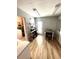 Well-lit laundry room equipped with appliances and ample storage space, next to the kitchen at 1098 Henry Balch Dr, Orlando, FL 32810