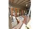 Comfortable covered patio with a cozy seating area, ideal for enjoying the outdoors at 1098 Henry Balch Dr, Orlando, FL 32810