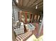Relaxing outdoor patio featuring comfortable seating and a fire pit table for cool evenings at 1098 Henry Balch Dr, Orlando, FL 32810