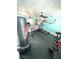 Spacious workout room equipped with exercise equipment, soft lighting, and ceiling fans at 1098 Henry Balch Dr, Orlando, FL 32810