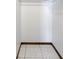 Walk-in closet with tiled flooring and white walls, ready for organization at 1109 Beatrice Dr, Orlando, FL 32810