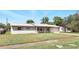 Charming home with brick accents and well-maintained landscaping at 1109 Beatrice Dr, Orlando, FL 32810