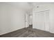 Spacious carpeted bedroom with double closet at 12557 Crayford Ave, Orlando, FL 32837