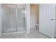 Tiled shower and water closet are conveniently located near the double vanity in the bathroom at 1312 Shinnecock Hills Dr, Davenport, FL 33896