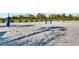 Sandy community volleyball court, perfect for outdoor games and friendly competition at 1312 Shinnecock Hills Dr, Davenport, FL 33896