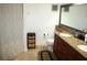 Bathroom with a double sink vanity, granite countertop, and shower with a curtain at 1321 Arbor Vista Loop # 325, Lake Mary, FL 32746