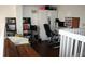 Loft bedroom with hardwood floors, ample storage, and a workspace area at 1321 Arbor Vista Loop # 325, Lake Mary, FL 32746