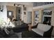 Open-concept living room with neutral tones, tile floors and comfortable seating at 1321 Arbor Vista Loop # 325, Lake Mary, FL 32746