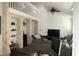 Bright living room with a high ceiling, tile flooring, and modern furnishings at 1321 Arbor Vista Loop # 325, Lake Mary, FL 32746