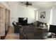 Bright living room with a high ceiling, tile flooring, and modern furnishings at 1321 Arbor Vista Loop # 325, Lake Mary, FL 32746
