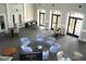 Spacious lounge area offering comfortable seating with natural light streaming through expansive windows at 1321 Arbor Vista Loop # 325, Lake Mary, FL 32746