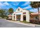 Inviting community center exterior with lush landscaping, perfect for gatherings and events at 1329 Paradise Dr, Lady Lake, FL 32159
