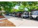 Various golf carts lined up, ready for a day on the well-manicured golf course at 1329 Paradise Dr, Lady Lake, FL 32159