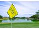 Picturesque golf course view featuring a pristine lake with a fountain and a charming gazebo at 1329 Paradise Dr, Lady Lake, FL 32159