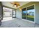 Screened in patio with fan; great for outdoor living and entertaining at 1329 Paradise Dr, Lady Lake, FL 32159