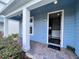 Welcoming front porch with brick pavers and views of the house number and front door at 14533 Orchid Island Dr, Orlando, FL 32827