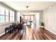 Open-concept space with hardwood floors, staircase, dining area and kitchen views at 14533 Orchid Island Dr, Orlando, FL 32827