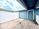 Private fenced patio area with charming brick pavers, offering a cozy and secluded outdoor space at 14533 Orchid Island Dr, Orlando, FL 32827