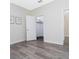 Neutral bedroom with stylish flooring and a walk-in closet at 14711 Winter Stay Dr, Winter Garden, FL 34787