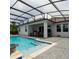 Beautiful screened-in pool, patio, and covered outdoor space, ideal for enjoying the Florida lifestyle at 14711 Winter Stay Dr, Winter Garden, FL 34787