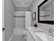 Bathroom featuring updated vanity, toilet, and subway tile shower with a bathtub at 1819 Sw 29Th St, Ocala, FL 34471