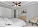 Bedroom with large bed, side table, and dresser at 1819 Sw 29Th St, Ocala, FL 34471