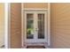 Elegant entryway with beautiful decorative glass double doors and tiled floor creating a grand and inviting entrance to the home at 1819 Sw 29Th St, Ocala, FL 34471