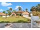 Beautiful single-story home with well-kept lawn and mature landscaping, featuring an attached two-car garage and attractive curb appeal at 1819 Sw 29Th St, Ocala, FL 34471