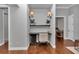 Desk nook featuring desk, chair, shelving and beverage cooler at 1819 Sw 29Th St, Ocala, FL 34471