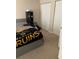 Simple bedroom features neutral walls, a large bed, and closet at 2053 #E Dixie Belle Dr # E, Orlando, FL 32812