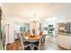 Open concept dining room and kitchen with plenty of natural light at 2070 Keyes Ln, Deltona, FL 32738